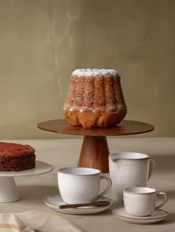 cappuccinotasse mit unterteller, sand